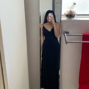 Low black gown with tie on the back